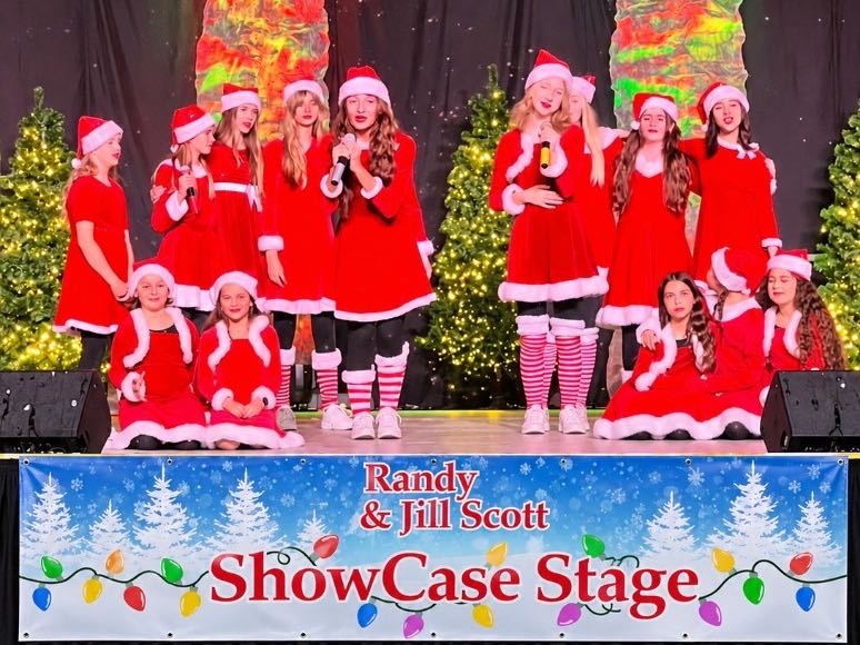 Performers singing on the Randy & Jill Scott Showcase Stage
